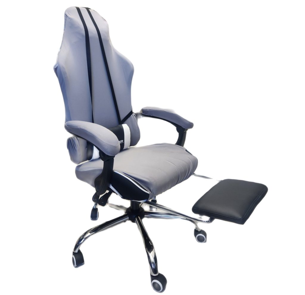 A large grey chair is shown against a white background. A black root rest extends from the seat of the chair.